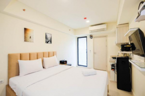 Cozy Living and Comfortable Studio Room at Meikarta Apartment By Travelio